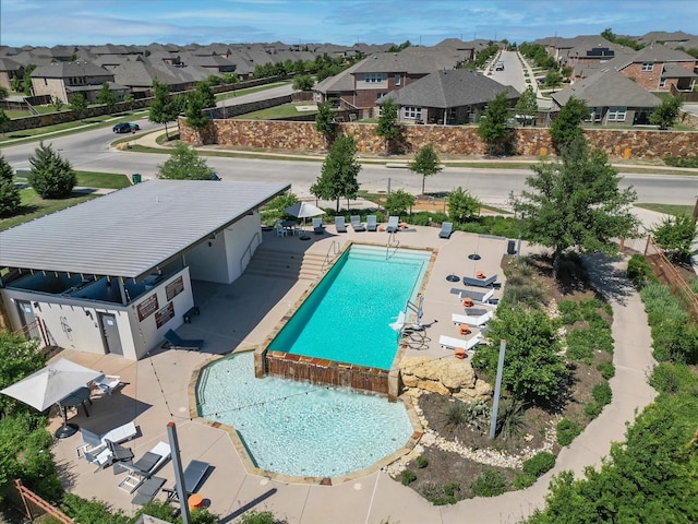 1129 Berrydale Dr, Northlake, TX 76226 - community pool with a residential view and a patio area