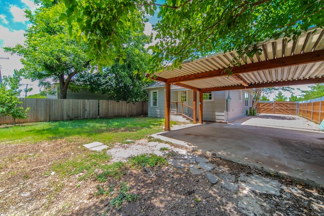 1504 E Rosedale St, Fort Worth, TX 76104 - fenced backyard with a carport
