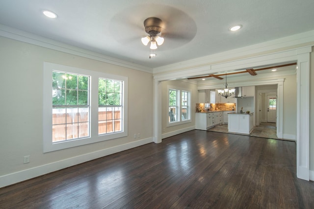 1504 E Rosedale St, Fort Worth, TX 76104 - unfurnished living room with crown molding, a chandelier, dark wood-style floors, ceiling fan, and recessed lighting