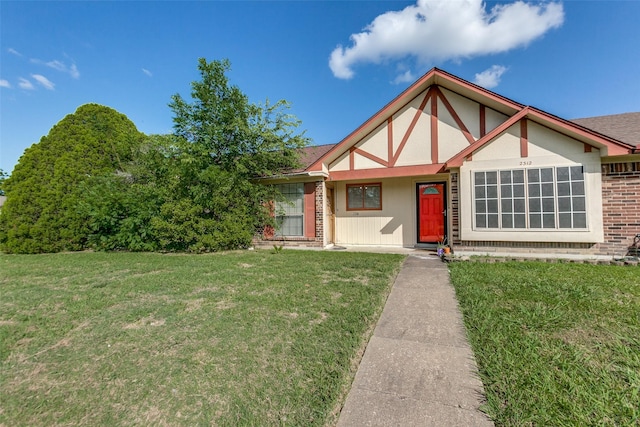 2314 Ember Lee Dr, Garland, TX 75040 - english style home featuring a front lawn