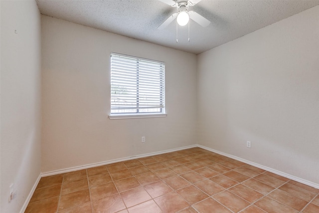 2314 Ember Lee Dr, Garland, TX 75040 - unfurnished room with a textured ceiling, ceiling fan, and light tile patterned floors