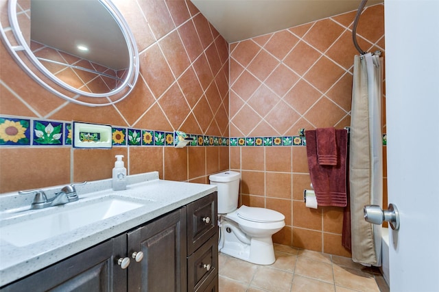 2314 Ember Lee Dr, Garland, TX 75040 - full bathroom featuring tile walls, vanity, tile patterned flooring, and curtained shower