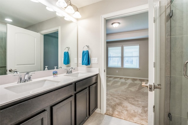 2111 Bentwater Ln, Frisco, TX 75036 - full bath featuring double vanity, a shower with door, and tile patterned floors