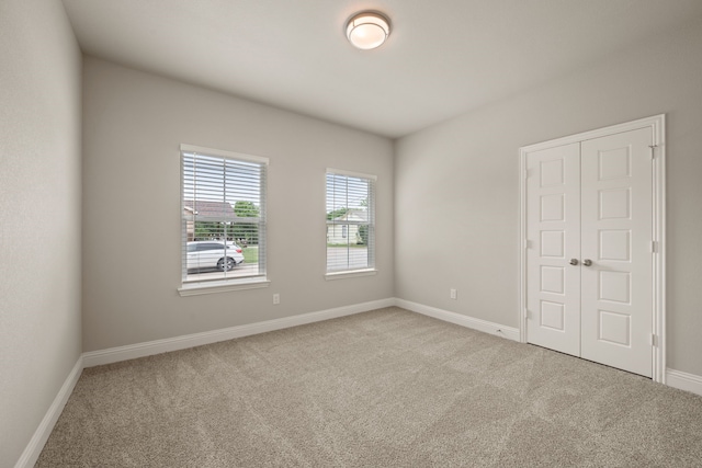 812 13th St, Plano, TX 75074 - unfurnished bedroom featuring carpet and a closet