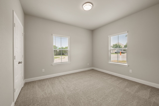 812 13th St, Plano, TX 75074 - carpeted empty room with plenty of natural light