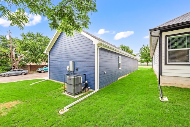 812 13th St, Plano, TX 75074 - view of property exterior featuring a central AC unit and a yard