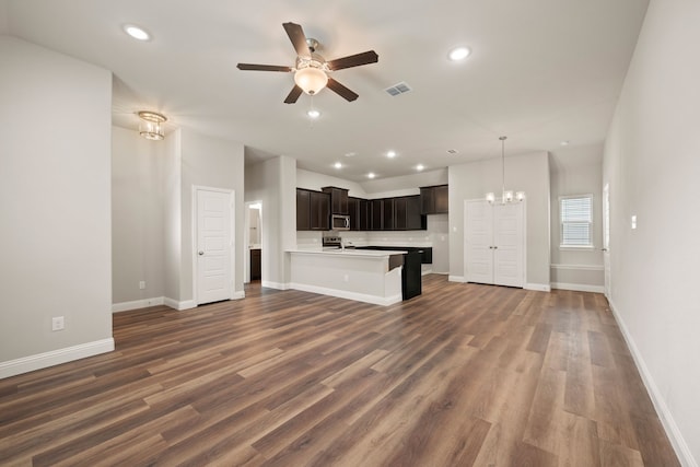 812 13th St, Plano, TX 75074 - unfurnished living room with a chandelier, ceiling fan, dark wood-style floors, and recessed lighting