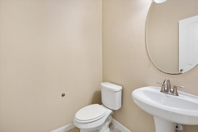 632 Fishback Cir, Plano, TX 75074 - half bathroom with a sink and toilet