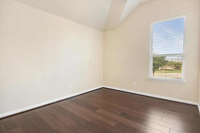 632 Fishback Cir, Plano, TX 75074 - spare room with lofted ceiling and dark wood-type flooring