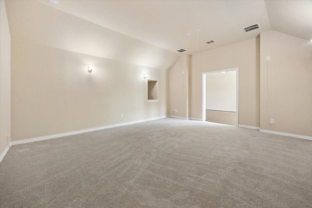 632 Fishback Cir, Plano, TX 75074 - spare room featuring vaulted ceiling and light colored carpet