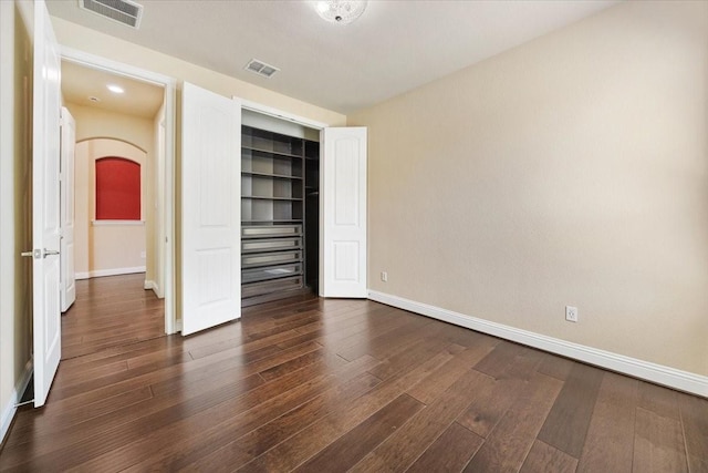 632 Fishback Cir, Plano, TX 75074 - unfurnished bedroom with dark wood-style flooring and a closet