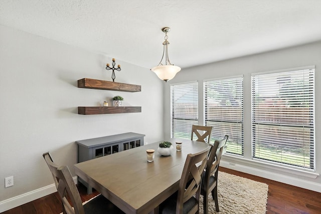 1227 Eaton Ln, Grapevine, TX 76051 - dining space with healthy amount of natural light and dark wood-type flooring