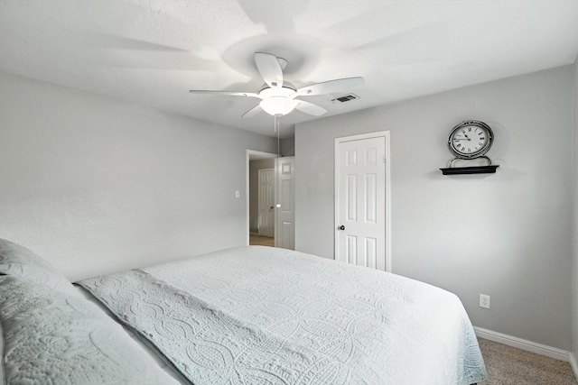 1227 Eaton Ln, Grapevine, TX 76051 - carpeted bedroom with baseboards and ceiling fan