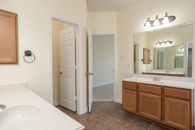 1220 Berkeley Dr, Burleson, TX 76028 - bathroom with two vanities and tile patterned flooring