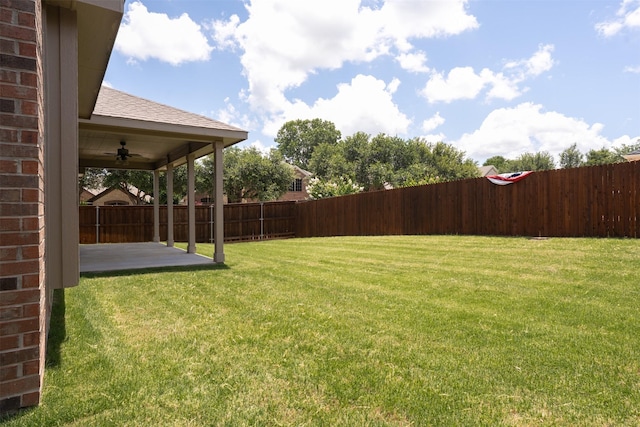 1220 Berkeley Dr, Burleson, TX 76028 - fenced backyard with a ceiling fan and a patio