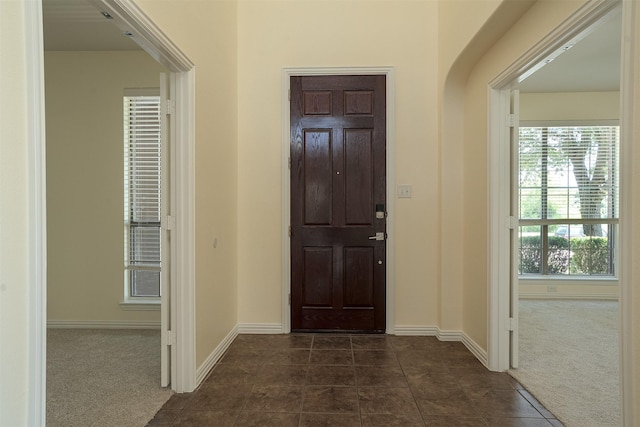 1220 Berkeley Dr, Burleson, TX 76028 - entryway with dark carpet and dark tile patterned flooring