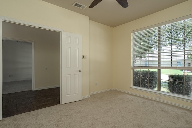 1220 Berkeley Dr, Burleson, TX 76028 - carpeted empty room with healthy amount of natural light, ceiling fan, and tile patterned floors