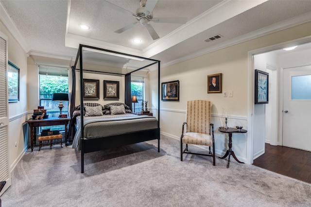 5205 Shady Springs Ct, Arlington, TX 76017 - carpeted bedroom with ornamental molding, a tray ceiling, ceiling fan, a textured ceiling, and recessed lighting