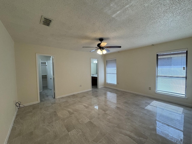 510 Betsy Ross Dr, Arlington, TX 76002 - empty room with ceiling fan and a textured ceiling