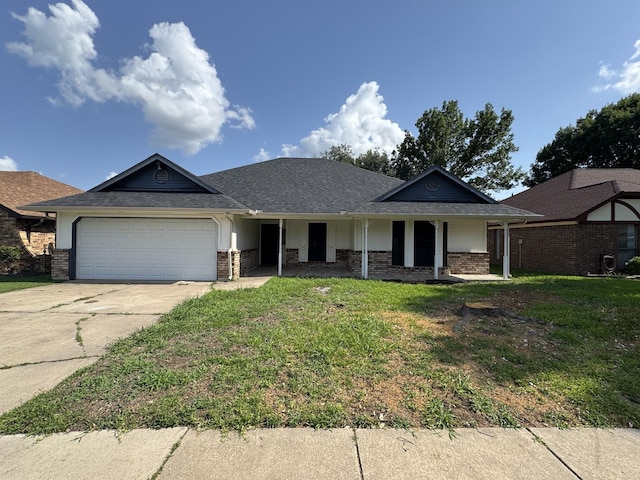 510 Betsy Ross Dr, Arlington, TX 76002 - view of front facade featuring covered porch, a garage, brick siding, and driveway