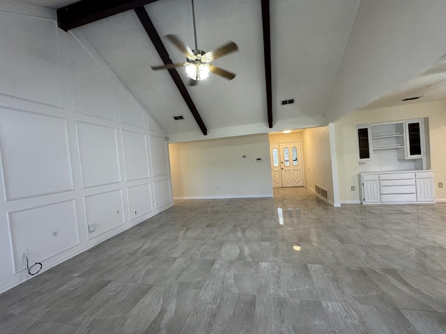 510 Betsy Ross Dr, Arlington, TX 76002 - unfurnished living room with a decorative wall, a ceiling fan, and marble finish flooring