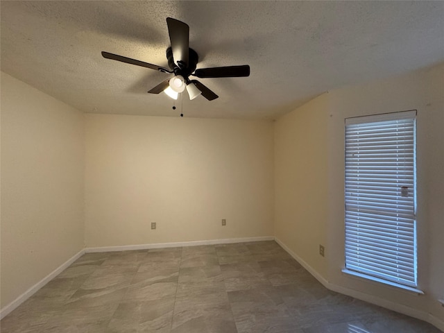 510 Betsy Ross Dr, Arlington, TX 76002 - empty room featuring ceiling fan and a textured ceiling