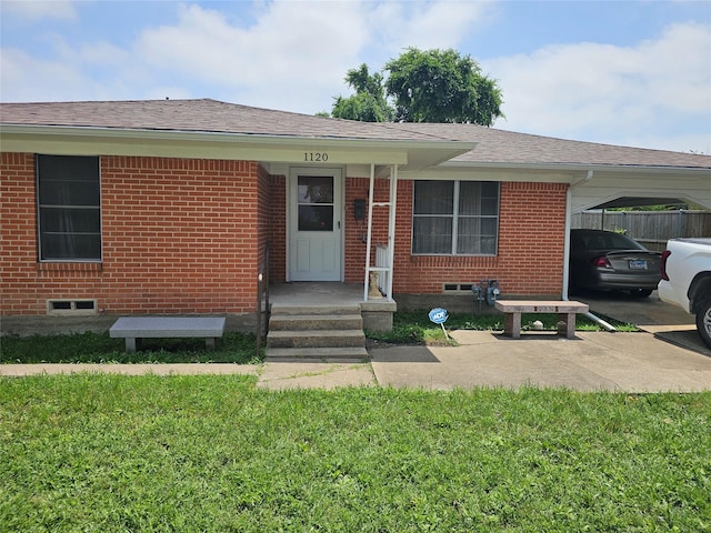 1120 H Ave, Plano, TX 75074 - single story home featuring brick siding, a shingled roof, and a carport
