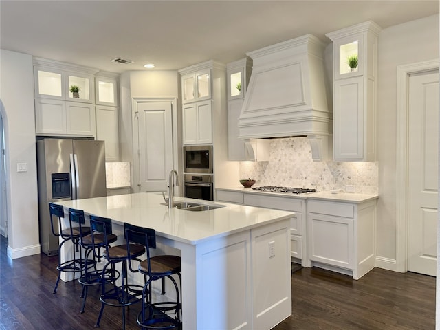 322 Harmony Hill Rd, Grapevine, TX 76051 - kitchen featuring stainless steel appliances, premium range hood, dark wood-style flooring, white cabinetry, and recessed lighting