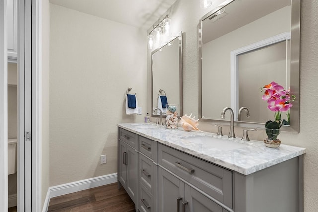 334 Pebblebrook Dr, Grapevine, TX 76051 - full bathroom featuring double vanity and wood finished floors