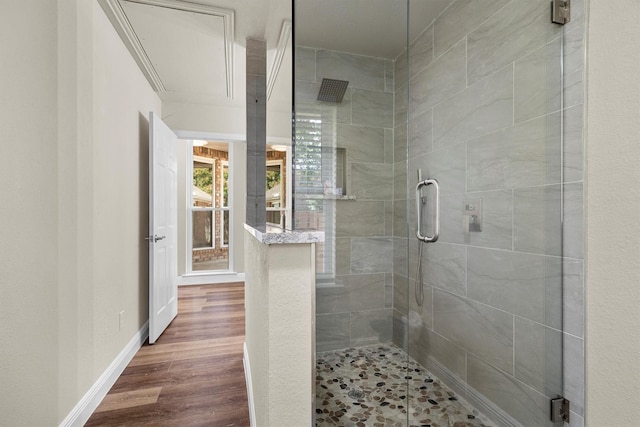 334 Pebblebrook Dr, Grapevine, TX 76051 - bathroom with a stall shower and wood finished floors