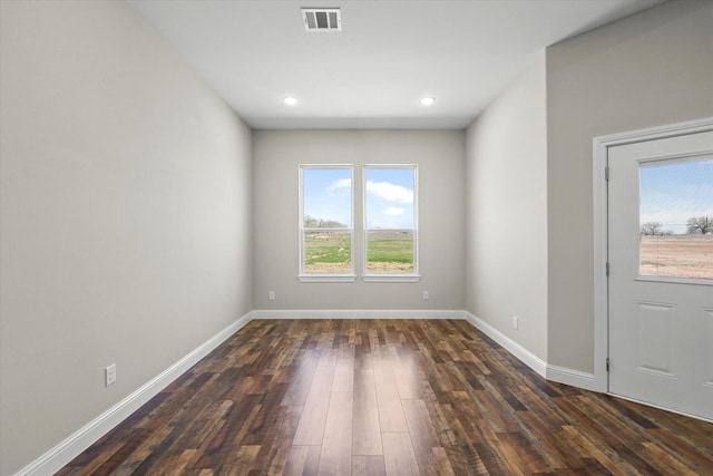 1955 Johnnie Dr, Springtown, TX 76082 - unfurnished room featuring healthy amount of natural light, dark wood finished floors, and recessed lighting