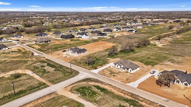 1955 Johnnie Dr, Springtown, TX 76082 - aerial overview of property's location featuring nearby suburban area