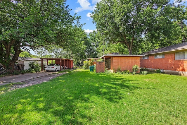 216 W Dexter St, Sherman, TX 75092 - view of green lawn with driveway