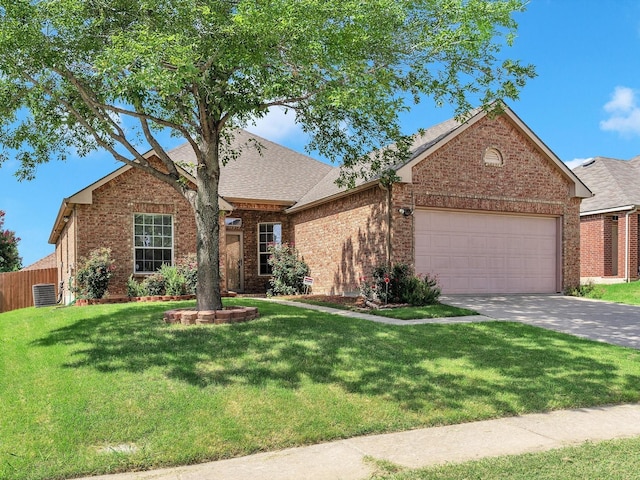 1928 Juniper Dr, Little Elm, TX 75068 - view of front of home with brick siding, an attached garage, a shingled roof, and driveway