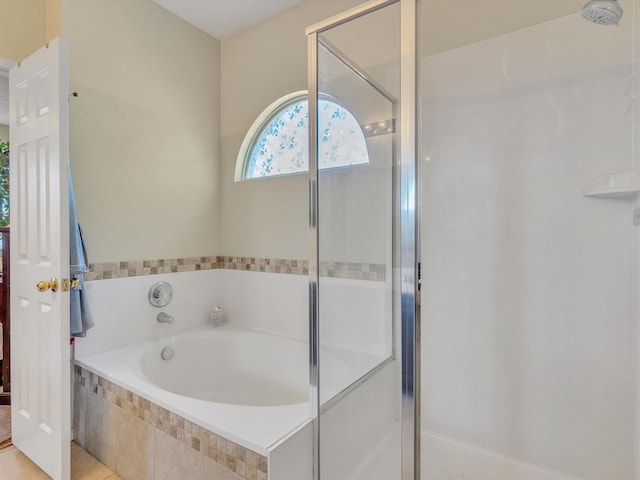 1928 Juniper Dr, Little Elm, TX 75068 - full bathroom featuring a stall shower and a garden tub