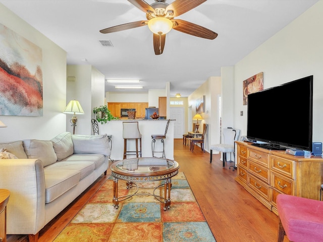1928 Juniper Dr, Little Elm, TX 75068 - living room featuring light wood-style flooring and ceiling fan