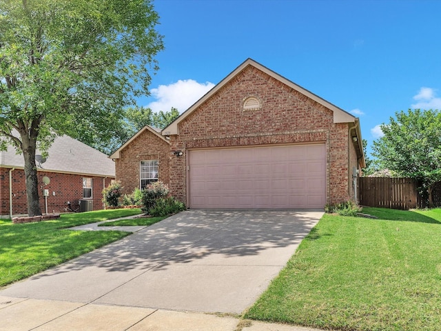 1928 Juniper Dr, Little Elm, TX 75068 - view of front of house featuring a garage, brick siding, and driveway