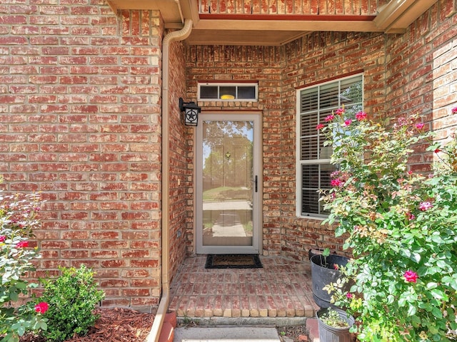 1928 Juniper Dr, Little Elm, TX 75068 - doorway to property with brick siding