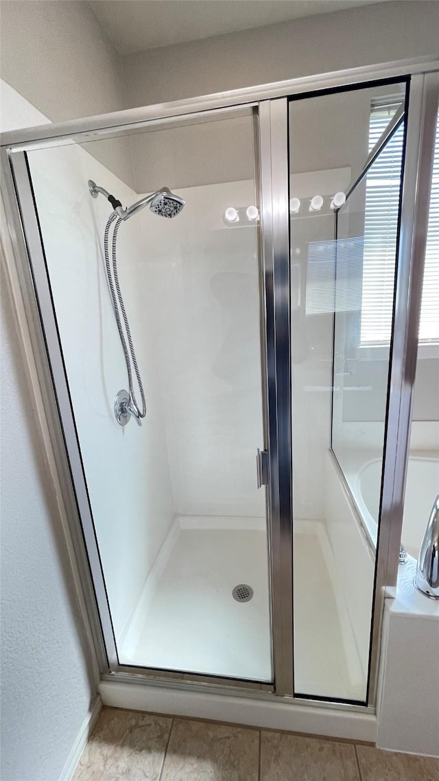 7811 Corona Ct, Arlington, TX 76002 - full bath with a stall shower and tile patterned flooring