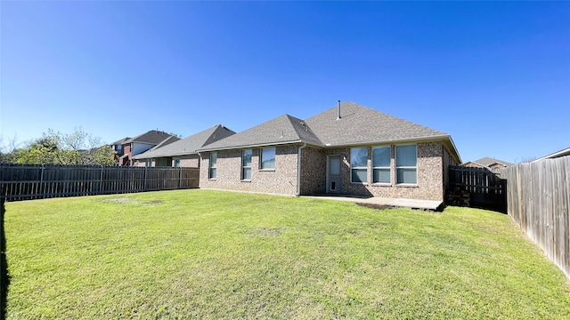 7811 Corona Ct, Arlington, TX 76002 - back of house featuring a fenced backyard, brick siding, roof with shingles, and a patio