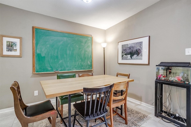 4913 Rutland Ave, Fort Worth, TX 76133 - dining room with light tile patterned floors