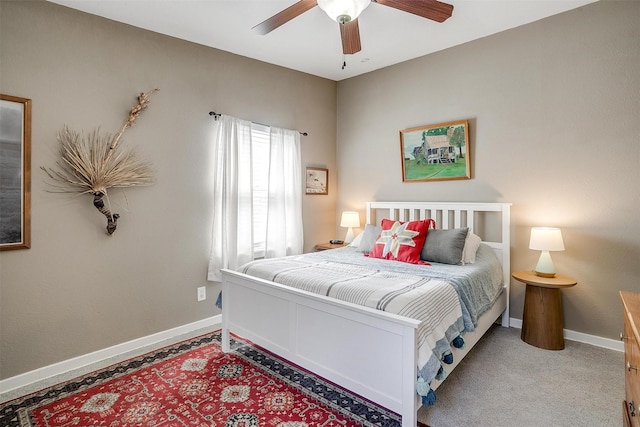 4913 Rutland Ave, Fort Worth, TX 76133 - carpeted bedroom with baseboards and a ceiling fan