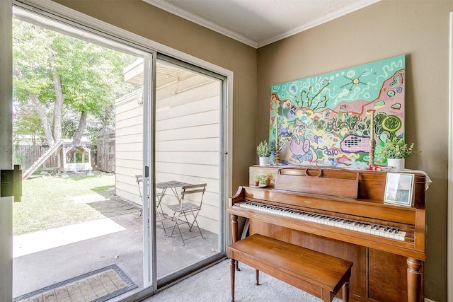 4913 Rutland Ave, Fort Worth, TX 76133 - doorway to outside featuring crown molding and carpet