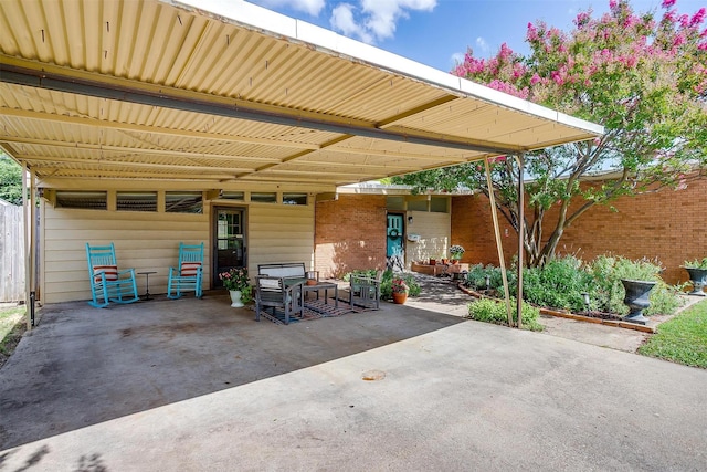 4913 Rutland Ave, Fort Worth, TX 76133 - view of patio / terrace with a carport