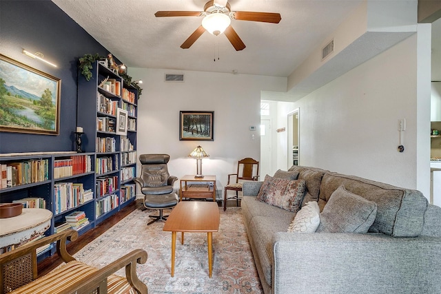 4913 Rutland Ave, Fort Worth, TX 76133 - living room featuring a ceiling fan and wood finished floors