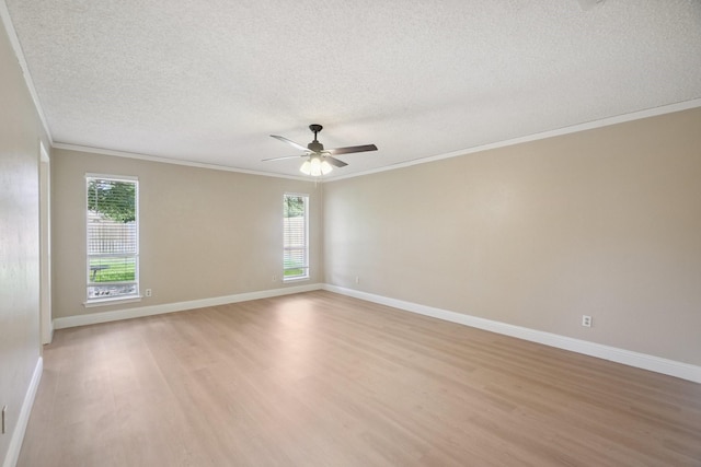2709 S Hillbrier Cir, Plano, TX 75075 - unfurnished room featuring light wood-type flooring, ornamental molding, plenty of natural light, a textured ceiling, and ceiling fan