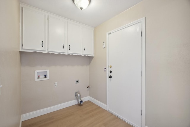 2709 S Hillbrier Cir, Plano, TX 75075 - laundry room with electric dryer hookup, washer hookup, cabinet space, light wood-type flooring, and gas dryer hookup