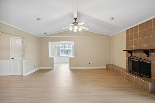 2709 S Hillbrier Cir, Plano, TX 75075 - unfurnished living room with a tile fireplace, light wood-style floors, a ceiling fan, a chandelier, and crown molding