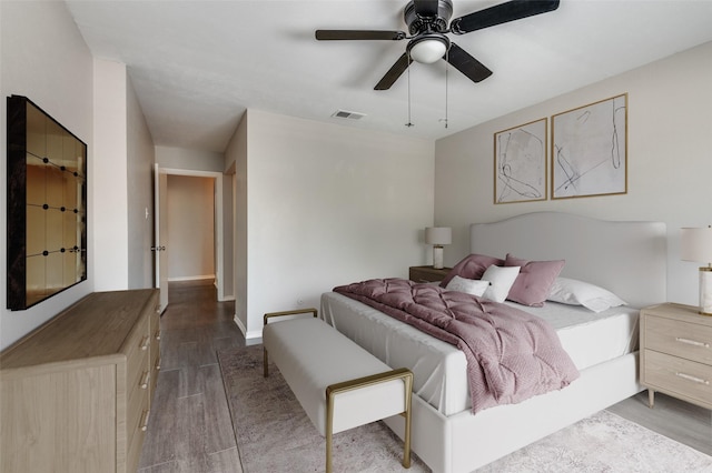 2630 Custer Pkwy Unit D, Richardson, TX 75080 - bedroom featuring wood finished floors and ceiling fan