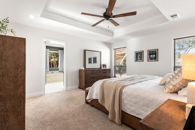 143 Shady Woods Ln, Denison, TX 75021 - bedroom with a tray ceiling, carpet floors, crown molding, connected bathroom, and recessed lighting